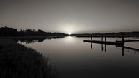 Sunrise on a Still Marsh