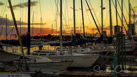 Sunset over sailboats -